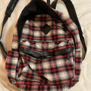 Claire’s flannel red/black/cream plaid backpack